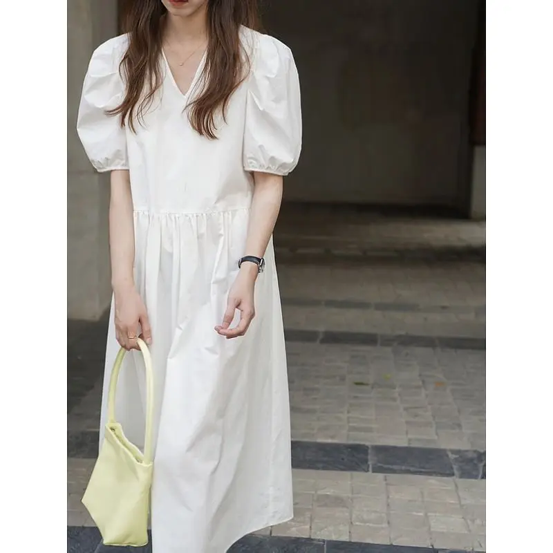 

2021 summer new Hepburn style white puff sleeve dress female Japanese gentle style platycodon sweet loose V-neck dress female