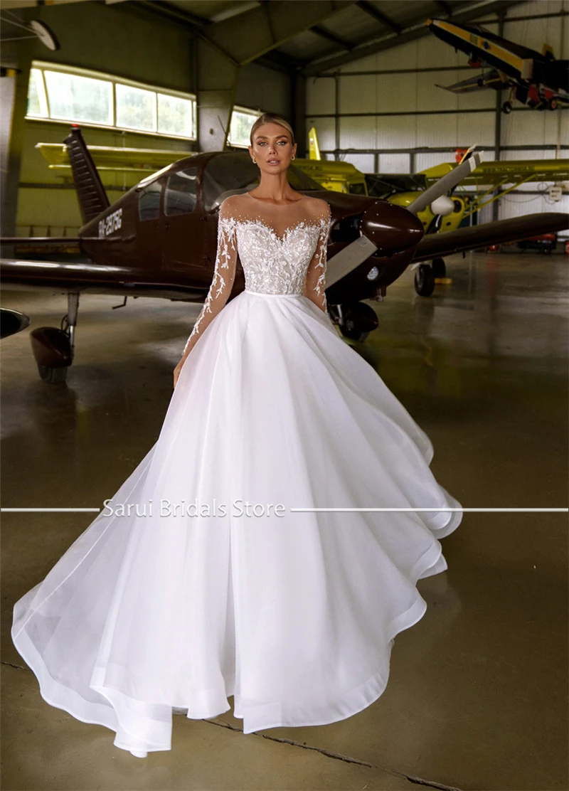 Customized Sheer Neck with Heavy Crystals Long Sleeves White Wedding Dress Organza and Tulle A-line Bling Bridal Dress