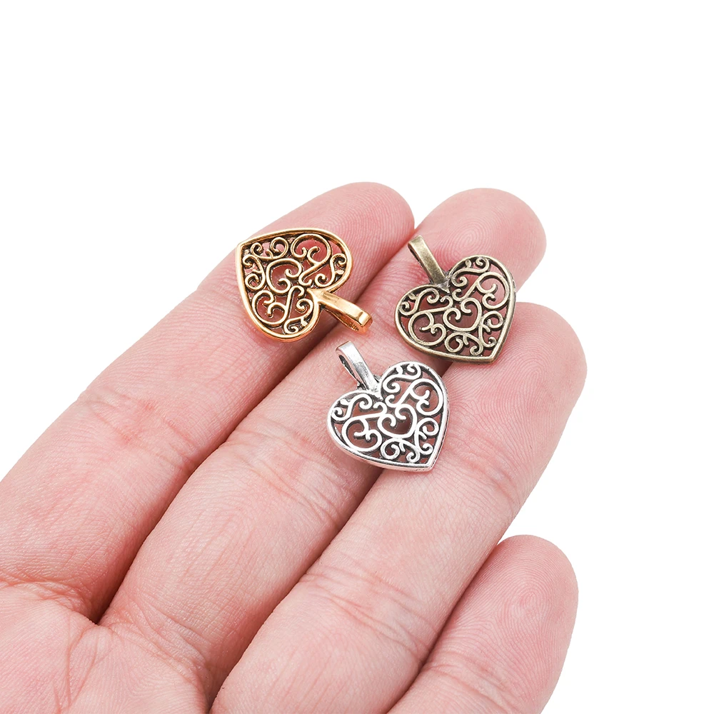 30Pcs/Lot Vintage Tibetan Metal Bronze Plated Hollow Out Heart Antique Pendants Charms Bracelet for DIY Jewelry Making Supplies