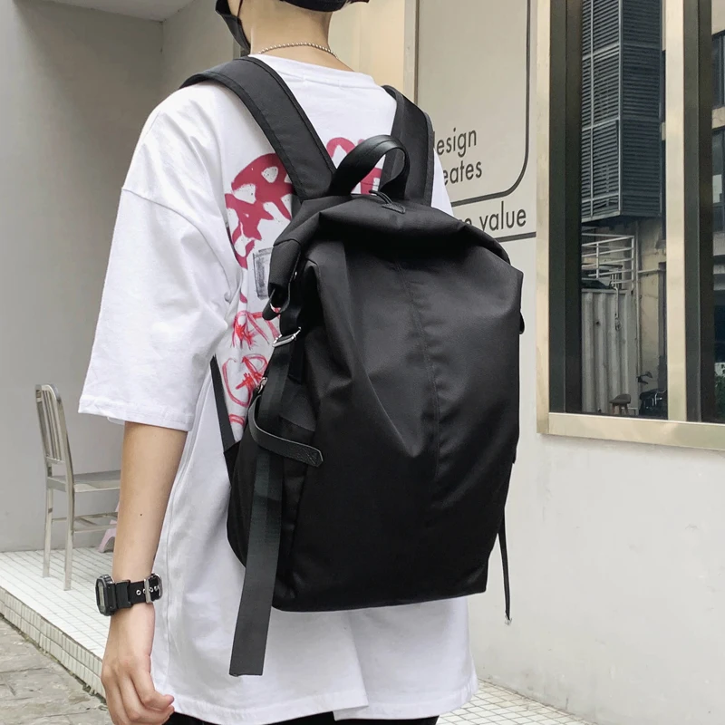 

Backpack men's and Japanese's simple retro large-capacity wild high school students' schoolbags fashion trend solid color backpa