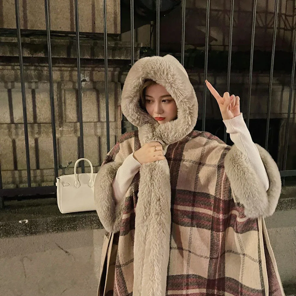 Winter 2023 Faux Fox Fur Hooded Poncho Woolen Coats Women Tassel Cloak Warm Outwear Winter New Plaid Cape For Women Loose Coat