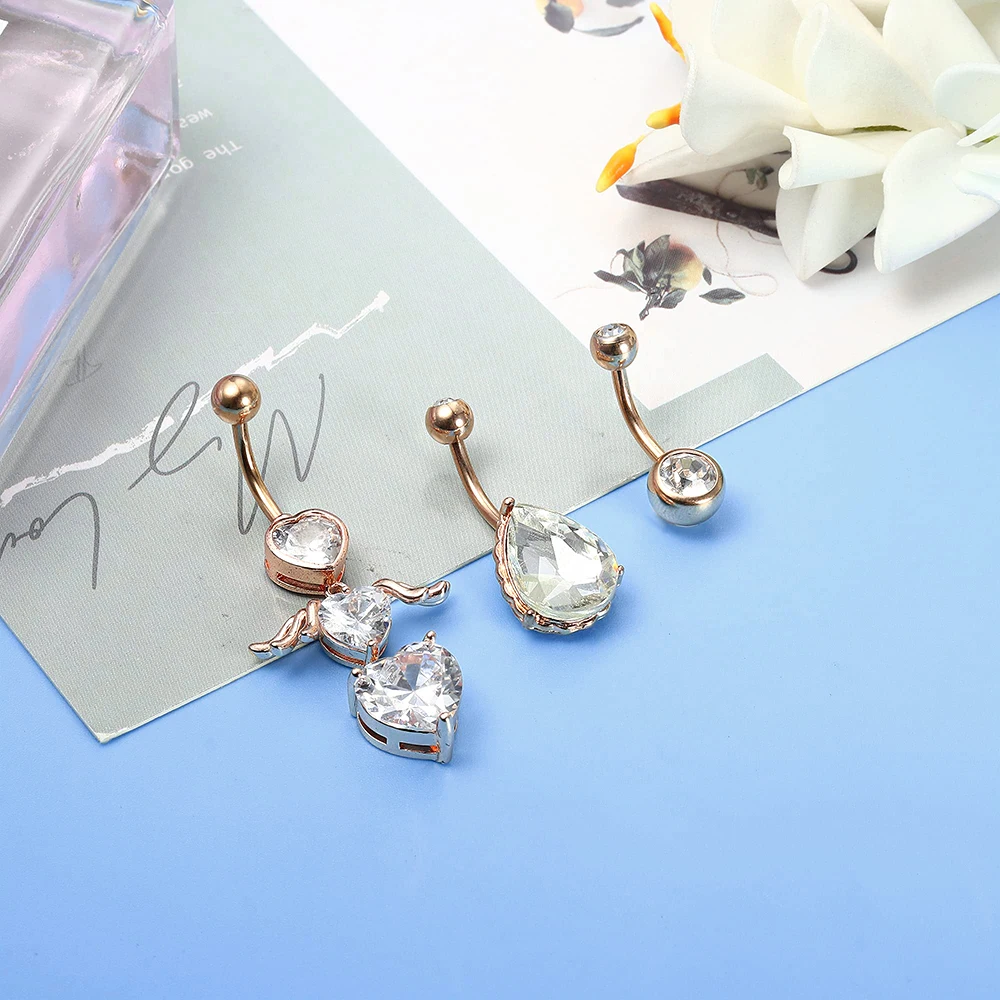 Reverse Curved 14G Belly Button Rings Dangled Heart Clear CZ Navel Rings 316L Surgical Steel Belly Piercing Barbell Body Jewelry view 3