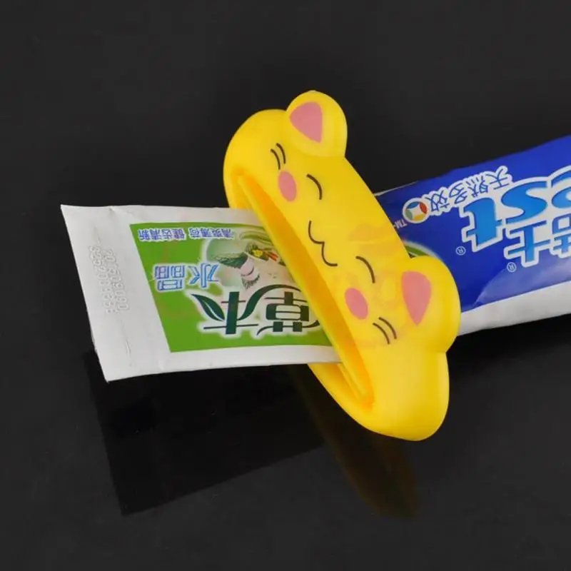 Presse-dentifrice de dessin animé, porte-tube, ensemble de pressage T1, clip pour enfants, distributeur facile, aléatoire, 1 pièce