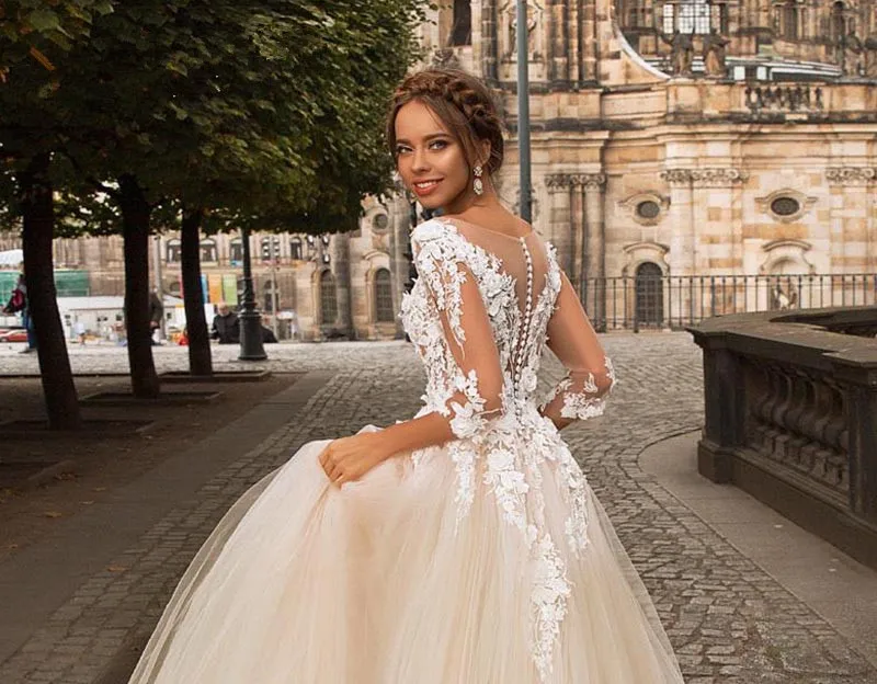 Booma Champagne Tulle Wedding Dresses with Three Quarter Sleeve 2020 Lace Appliques Bridal Gown Illusion Back Button Sweep Train