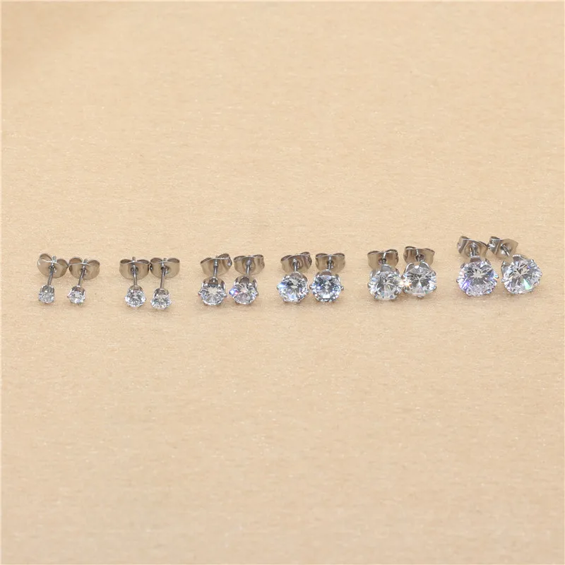 Klassische Ohrstecker aus Edelstahl, weiß, mit AAA-runden weißen Zirkonia-Steinen, 3 mm. – Detail 8