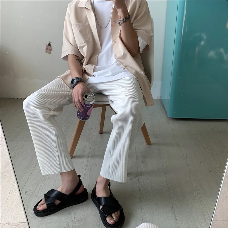 Koreańska wersja plisowane proste spodnie męskie nowa moda elastyczna talia Casual spodnie męskie Streetwear lodowy jedwab spodnie męskie spodnie