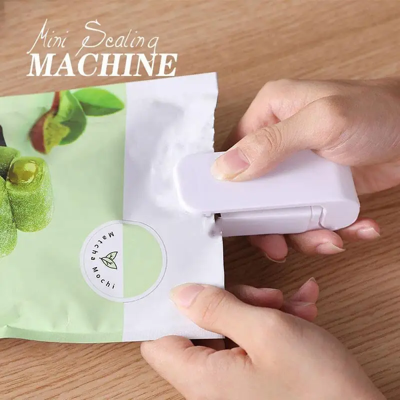 Portable mini sealing machine, snack bag sealing machine, household hand pressure heat sealing machine, plastic sealing clip