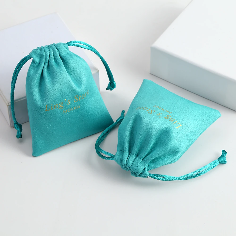 100 tassen met trekkoord met gepersonaliseerde logoprint Aangepaste sieradenverpakkingen Zakjes voor chique bruiloftsbedankjes Roze flanel Cosmetische tassen voor ringen Kettingarmbandhanger