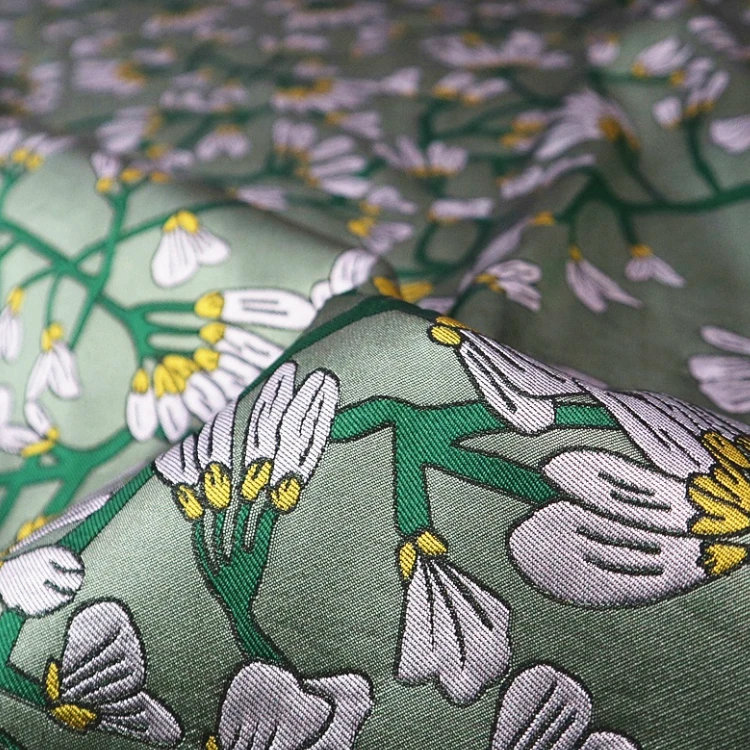 Elegant daffodil three-dimensional yarn-dyed jacquard fashion fabric, sewing fabric factory shop is not out of stock