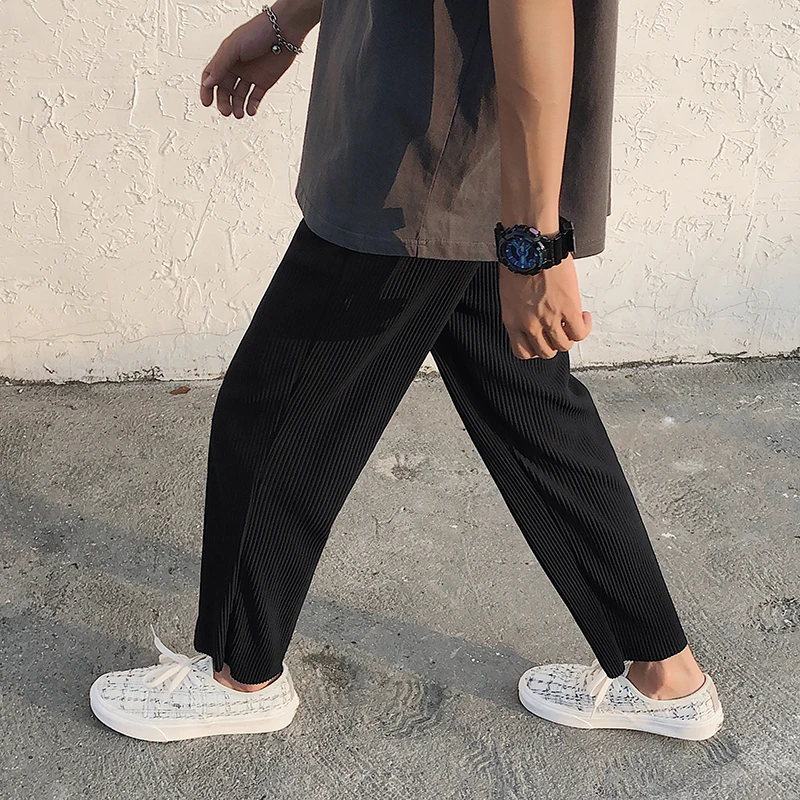 Koreańska wersja plisowane proste spodnie męskie nowa moda elastyczna talia Casual spodnie męskie Streetwear lodowy jedwab spodnie męskie spodnie