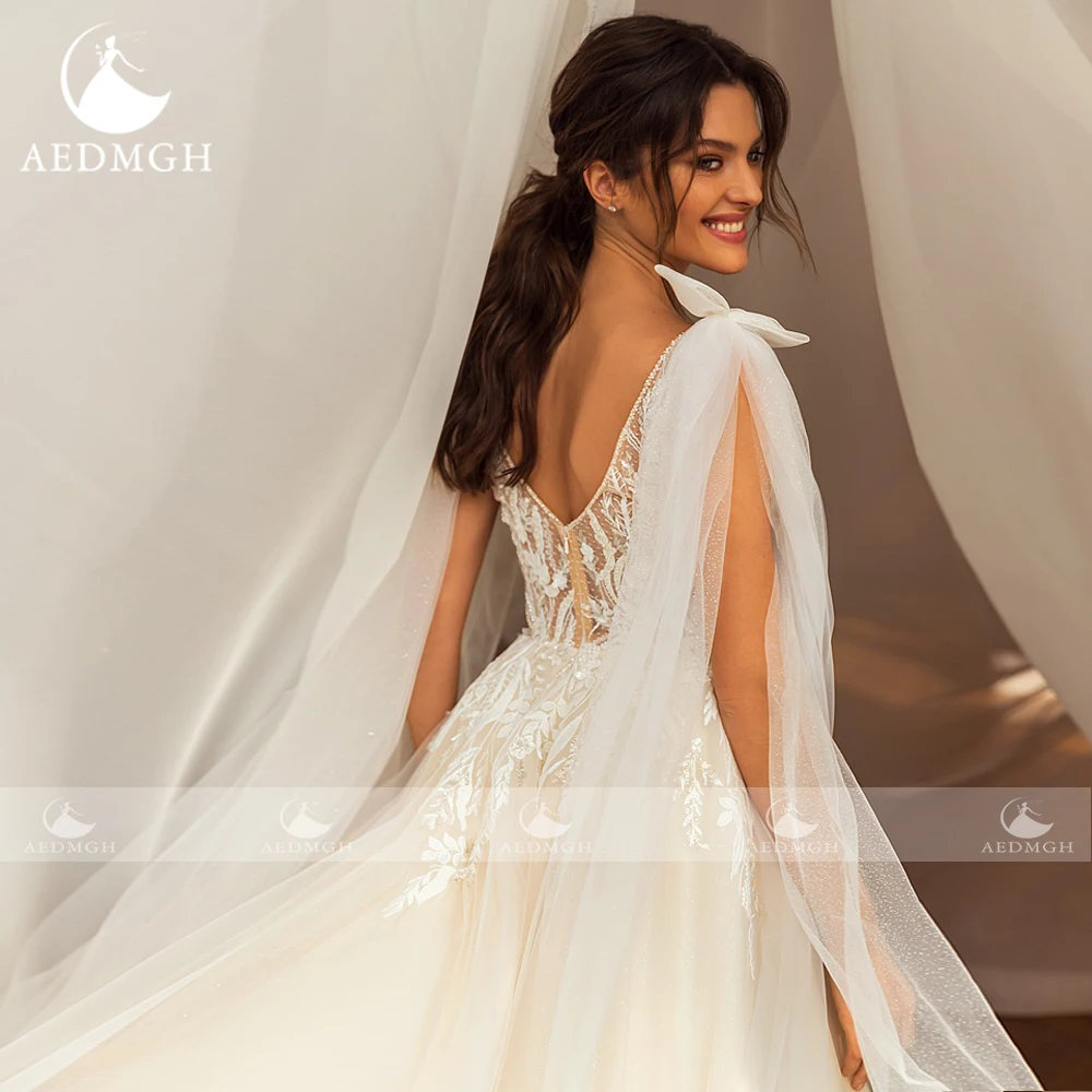 Aedmgh A-Line Abiti da sposa Scollo a V Fiocco senza maniche Lucido Robe De Mariee Perline Applicazioni di pizzo Abito da sposa su misura di lusso