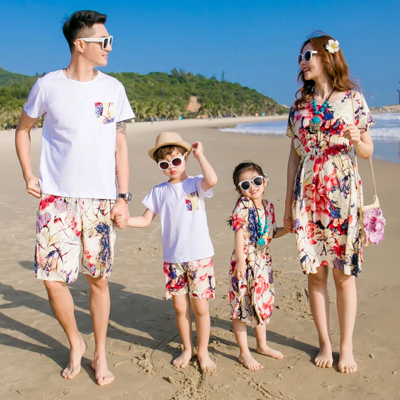 

New parent-child couple a family of four family holiday travel vacation beach wind lily print skirt temperament suit cute