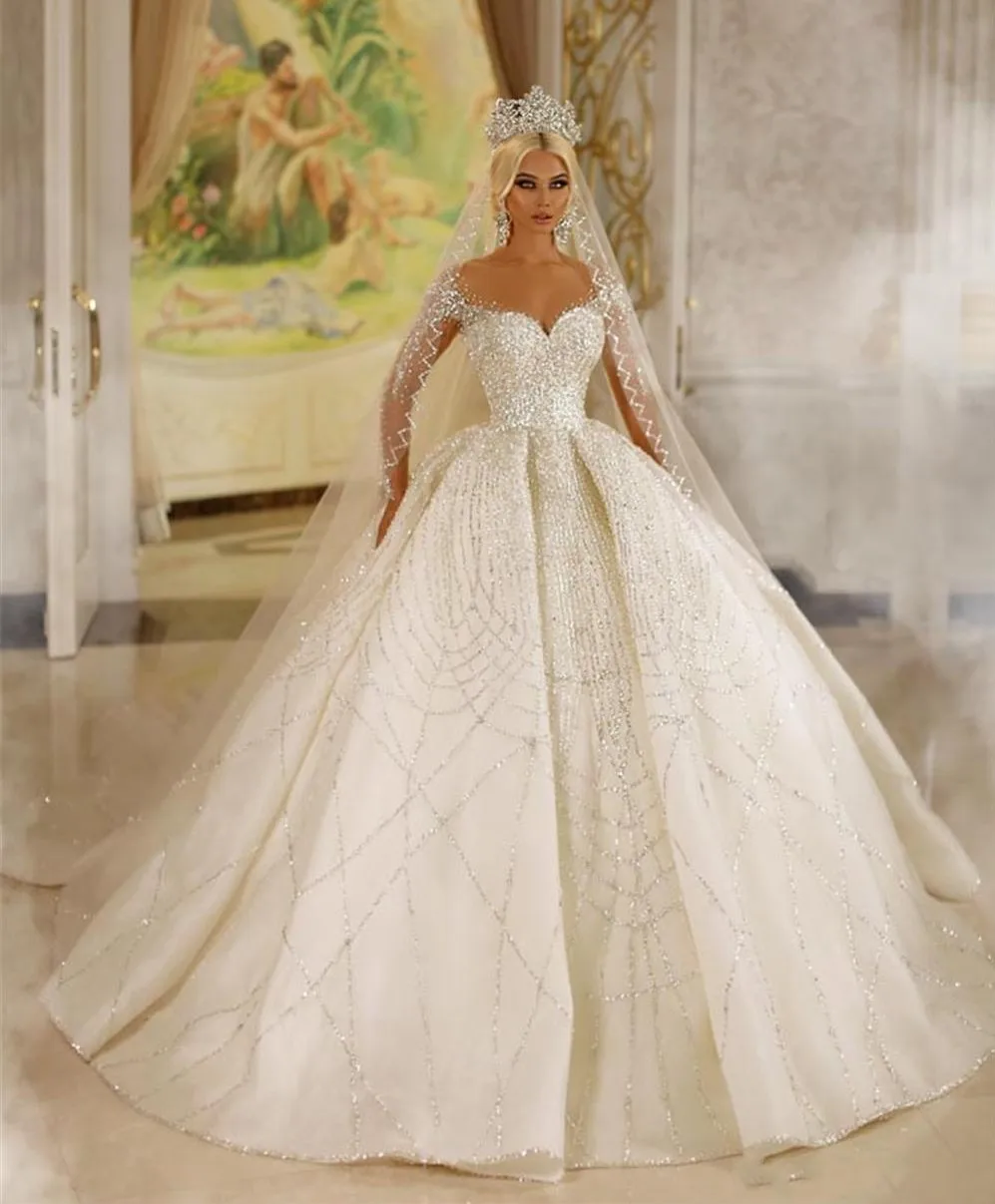 Lusso nuovo arrivo Dubai cristalli principessa abito da sposa bianco 2023 maniche Illusion perline gonfie abito da sposa corte treno