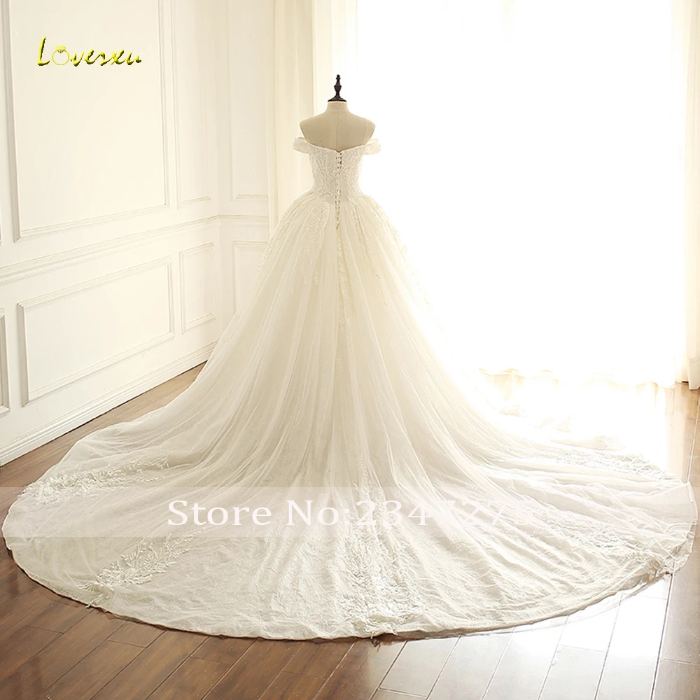 Loverxu-vestidos de novia de princesa con ilusión Sexy, apliques de lujo con cuentas de perlas, tren de corte, vestidos de novia Vintage, 2024