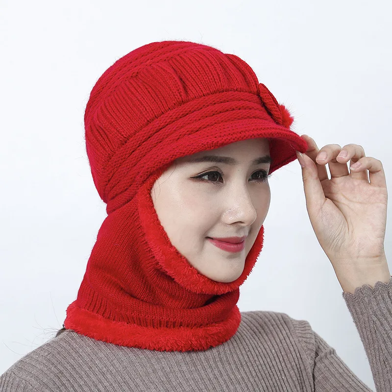 The new winter wool sleeve head warm hat women's hat wholesale ear protection middle-aged grandmother jumper hat knitted hat