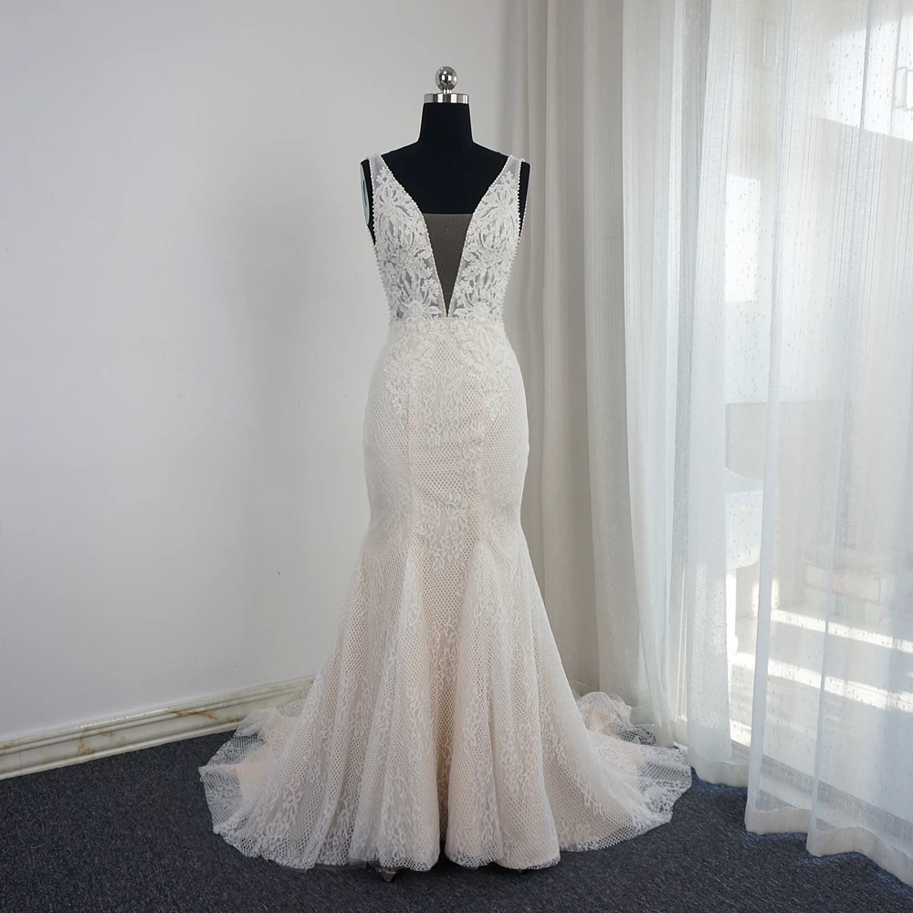 Abiti da sposa a sirena con scollo profondo e schiena bassa con perline senza maniche Appliqued abito da sposa con foto reale Vestido de Novia