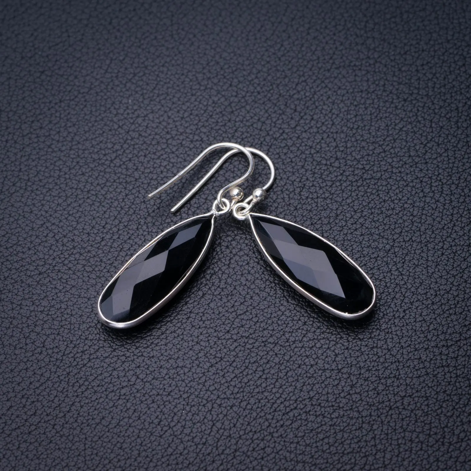 

Серьги из серебра 1,5 пробы с натуральным черным ониксом