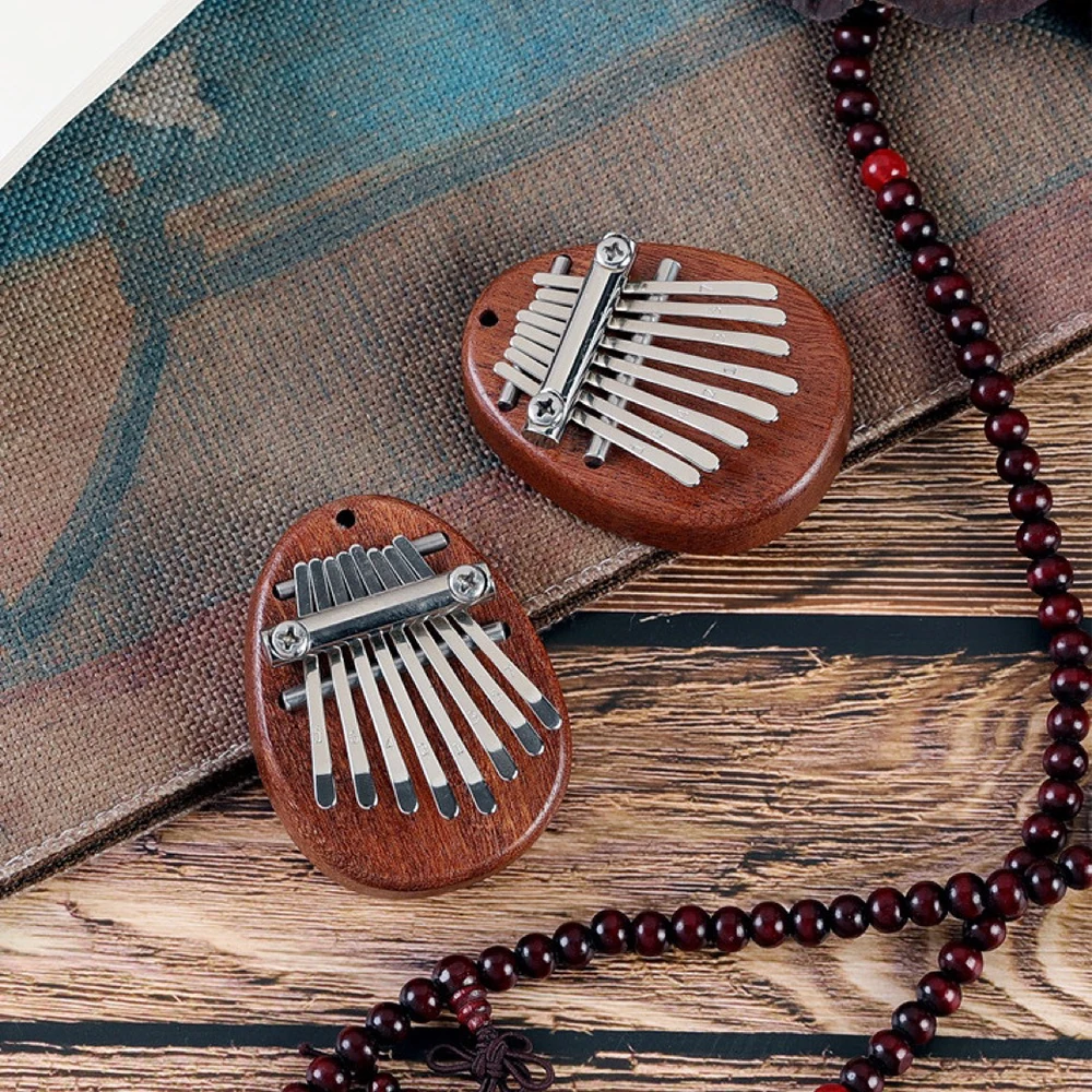 8 Key Mini Kalimba Portable Finger Thumb Piano Marimba Portable Musical Accessory Pendant Exquisite Exercise Gift for Beginners