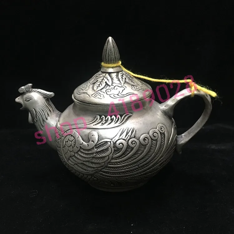 

Pure white copper, Qianlong year system, embossed Phoenix teapot / wine pot, home / living room decoration crafts, collectibles.