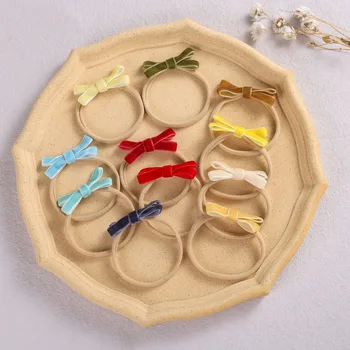 صغيرة المخملية القوس الطفل عقال الفتيات جميلة Hairband النايلون الصلبة الأطفال صور الدعائم الخريف مرونة الاطفال اكسسوارات للشعر