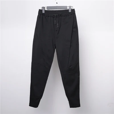 Dark cut stitching irregular design slim casual pants nine-minute chaps men's style Korean version of bound leg pants