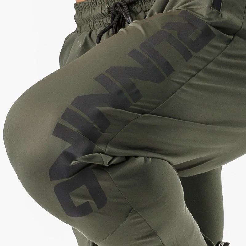 Pantalones de chándal elásticos para hombre, pantalones largos ajustados de secado rápido para gimnasio y entrenamiento