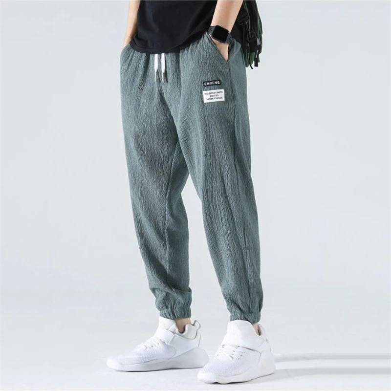 Pantalones bombachos de seda de hielo para hombre, pantalón holgado hasta el tobillo, cintura elástica, talla grande