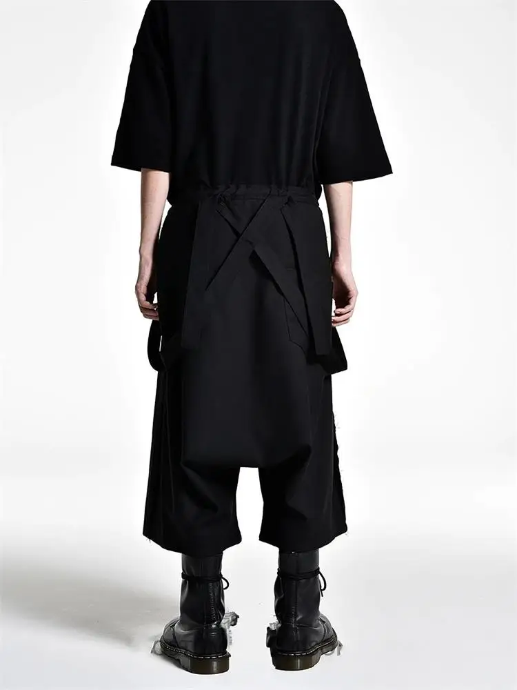 

The New Summer Men's Plain Color Casual Pants With Large Size Straps Design Loose Seven Cent Pants Fake Two Straight Pants