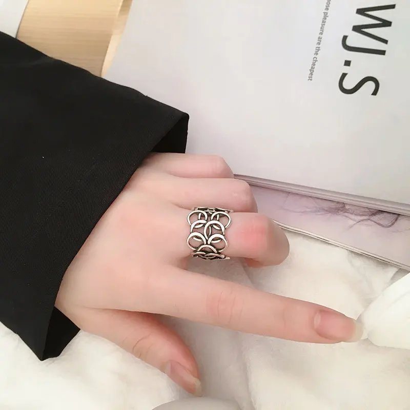 QMCOCO Silver Color Trendy Punk Rings Chic Irregular Weaving Multiple Layers Hollow Out Round Geometric Rings Woman Jewelry