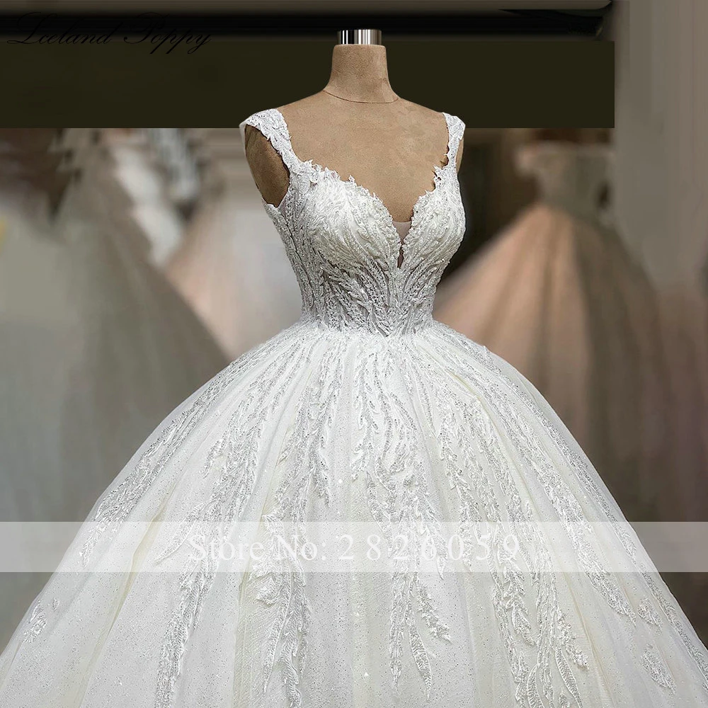 Lceland Poppy Customized Ball Gown V-Neck Wedding Dresses Sleeveless Beaded Lace Appliques Floor Length See Through Bridal Gowns