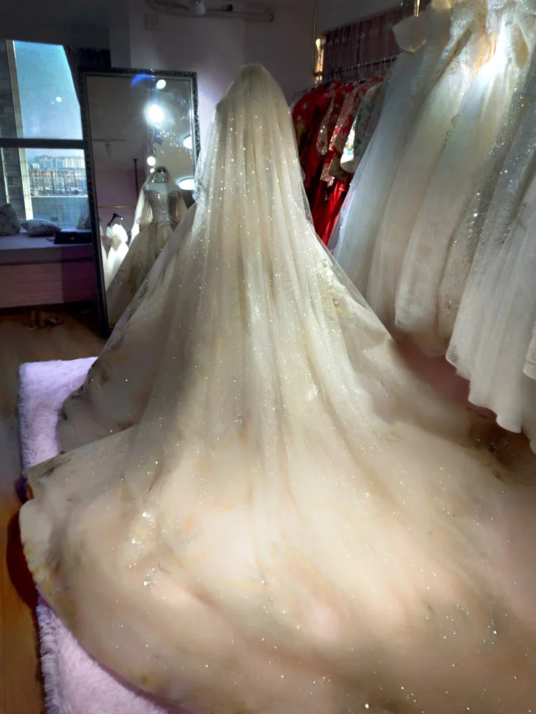 BlingแชมเปญWedding Veils Cathedralยาวรถไฟหวีพ่นSequins Ivory Luxuryเจ้าสาว2021เจ้าสาวอุปกรณ์เสริมใหม่