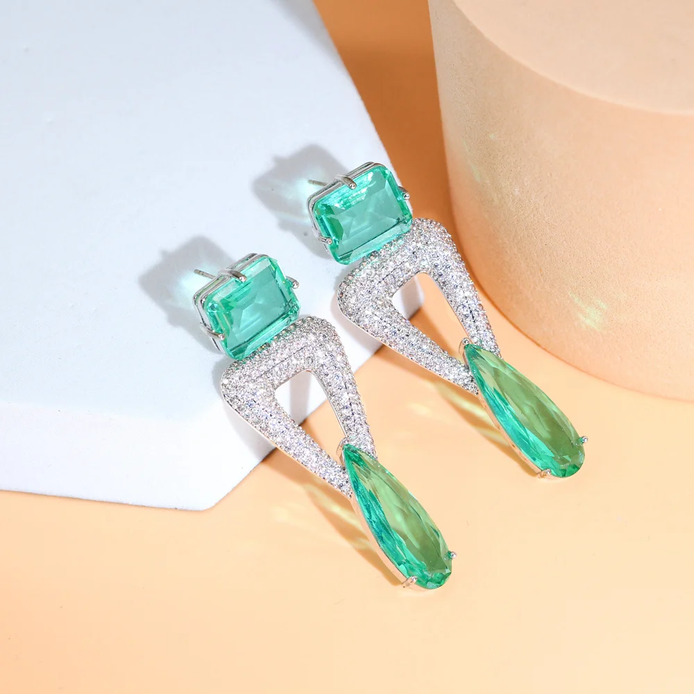 CWWZircons New Trendy Triangle Green Water Drop Long Crystal Earrings for Women Fancy CZ Party Wedding Dress Jewelry CZ118