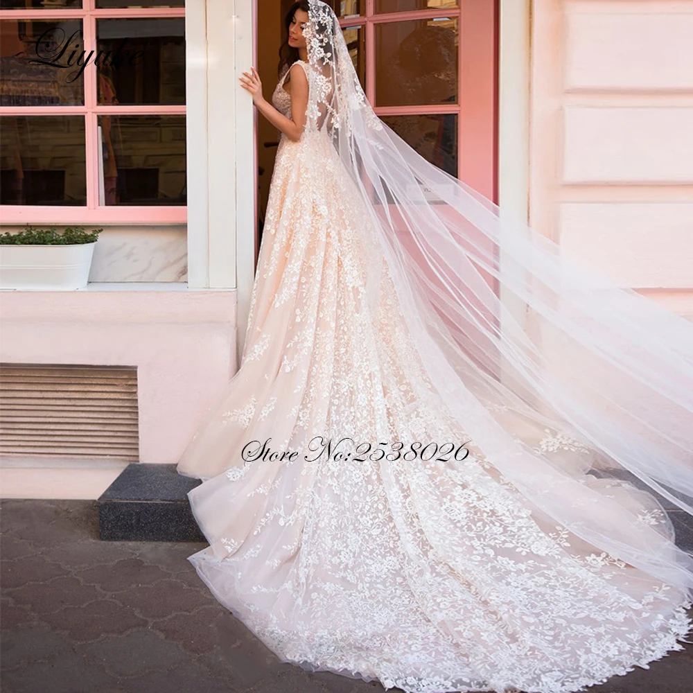 Liyuke Delicate A Line Wedding Dress With Elegant Lace Of Backless Wedding Gown With Deep V-Neckline