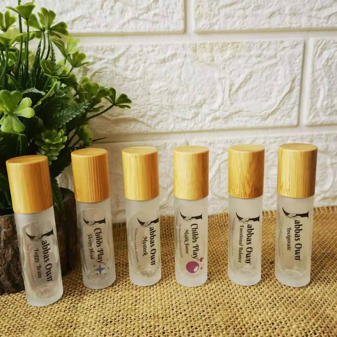 

100pcs Engraving logo Bamboo Lid 10ml Refillable Spray Bottle Massage Roll On Glass Bottles Essential Oil Fragrant Roller Bottle