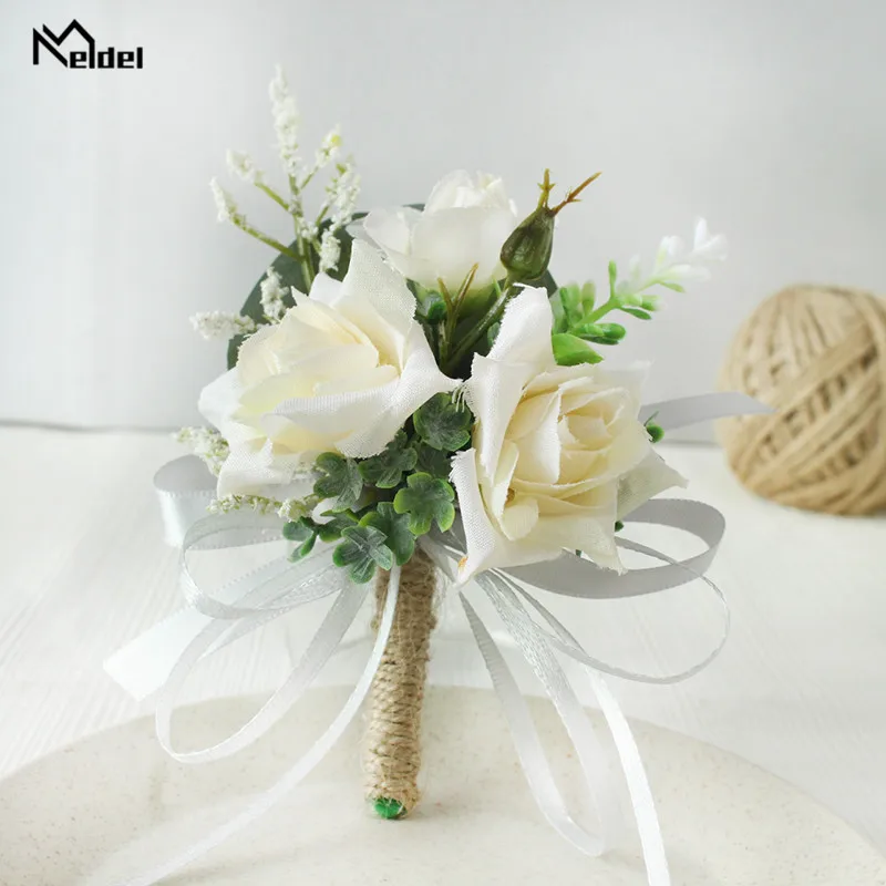 Meldel Boutonniere Corsage แต่งงานสร้อยข้อมือ Bridesmaids สีขาวเจ้าบ่าว Boutonniere ดอกไม้ Corsages และ Boutonnieres เข็มกลัด