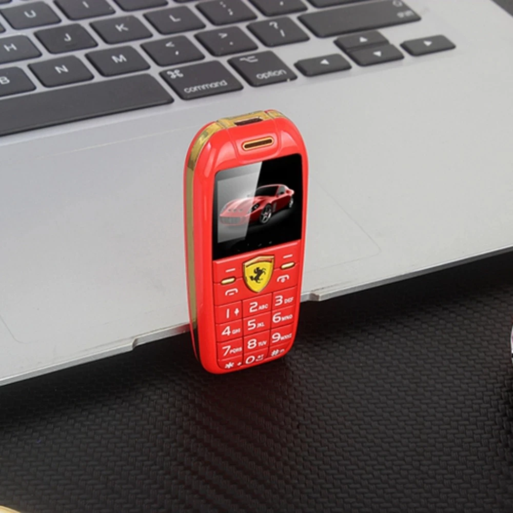 F488 حجم صغير GSM الهاتف المحمول أصغر سيارة دفع زر الهاتف 2 سيمز مفتاح السيارة ماجيك صوت MP3 بلوتوث طالب الهاتف الخليوي