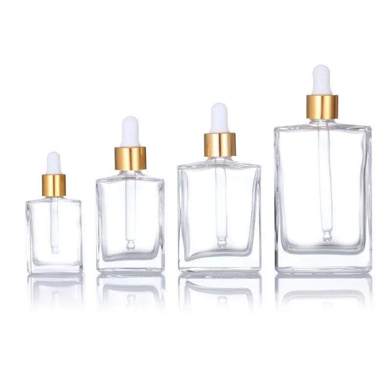 

Luxury Cosmetic Travel Perfume 15ml 30ml 50ml 100ml Square Rectangle Clear Glass Dropper Bottle With Gold Dropper Lids E liquid