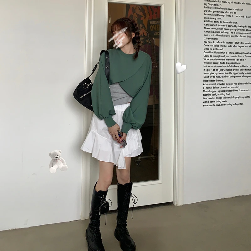 Fashionable Design Irregular Short Sleeved Women's Sweater Looks Thin and Tall Lady Tops