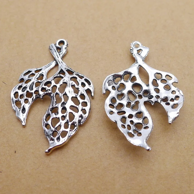 Newest 10 Pieces 23*38mm Antique Silver Color Hollow Leaf Charms Necklace Bracelet Pendant Crocs Charms For Jewelry Making