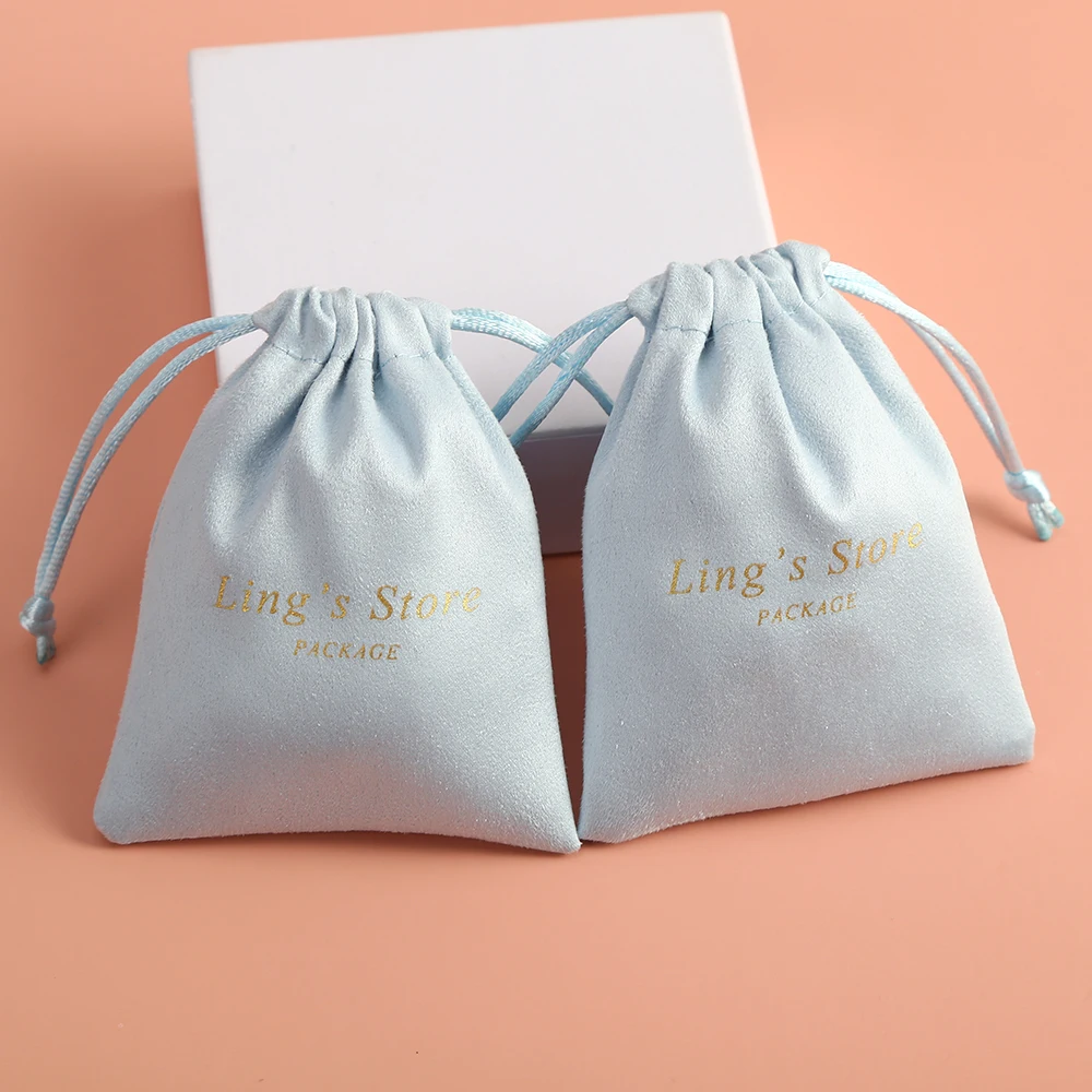 100 tassen met trekkoord met gepersonaliseerde logoprint Aangepaste sieradenverpakkingen Zakjes voor chique bruiloftsbedankjes Roze flanel Cosmetische tassen voor ringen Kettingarmbandhanger