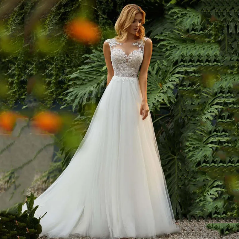 Appliques di pizzo trasparente a-line abiti da sposa vedere attraverso la schiena abiti da sposa 2021 modesto senza maniche Beach Vestidos De Mariee