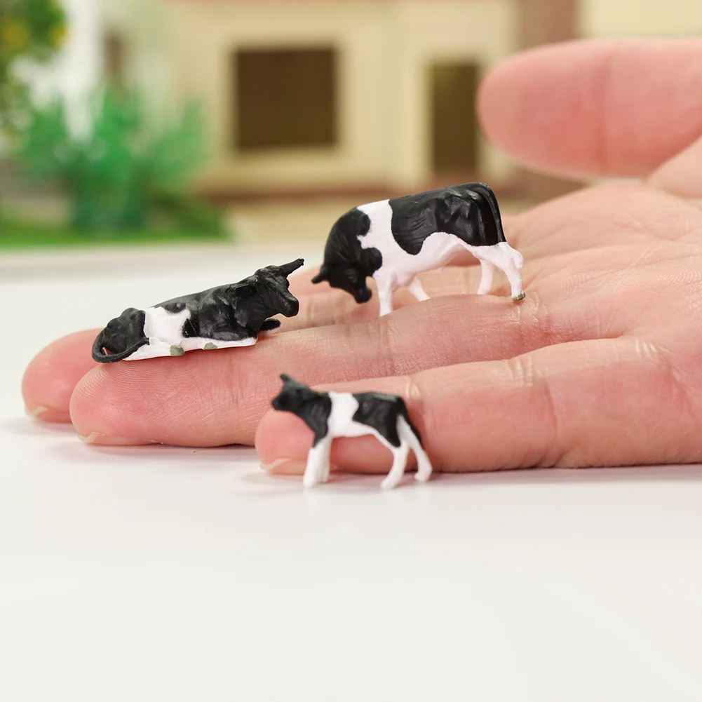 Evemodel 32pcs Model Railway HO Scale 1:87 Painted Farm Animals Black White Cows 8 Different Poses P8714