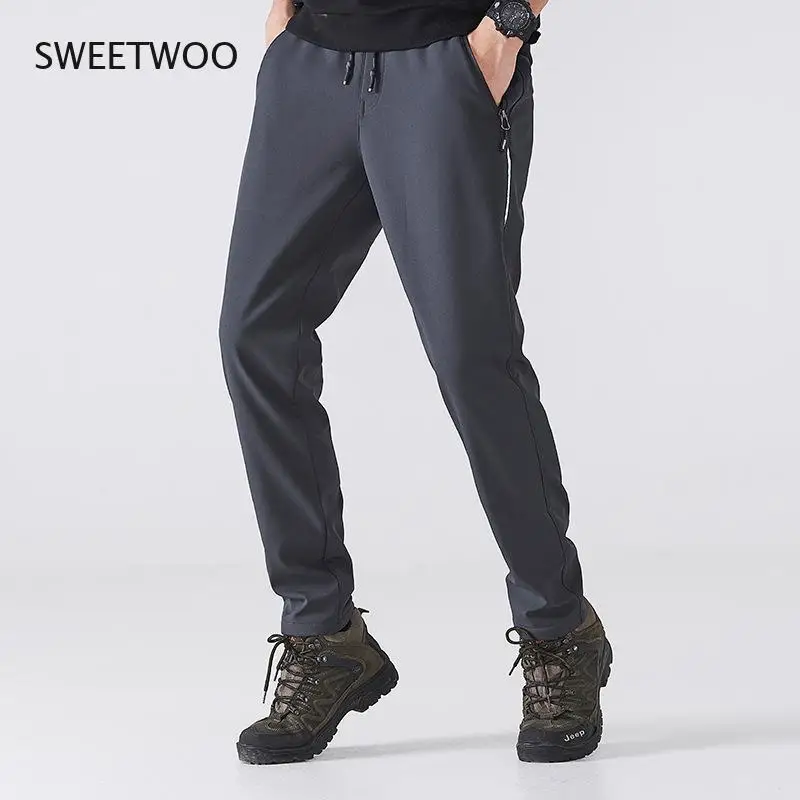 Picture 3: Winter 2021 Men's Casual Running Pants Slim Thicken Warm Sports Outdoor Hiking Pants Couples Hiking Ski Pants