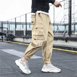 Neue Männer der Seite Taschen Cargo-Hose Schwarz Hip Hop Harem Hosen Casual Männlichen Jogger Jogginghose Mode Streetwear Hosen 5XL