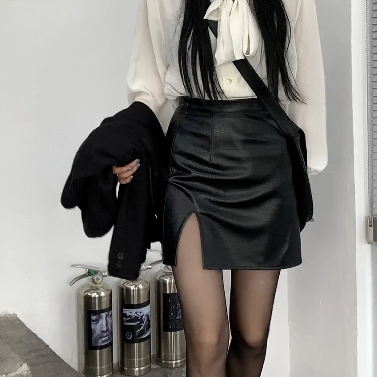 

2021 Sexy slit thin hip skirt female autumn and winter PU leather skirt sweet cool style hot girl fried street black DQ1292