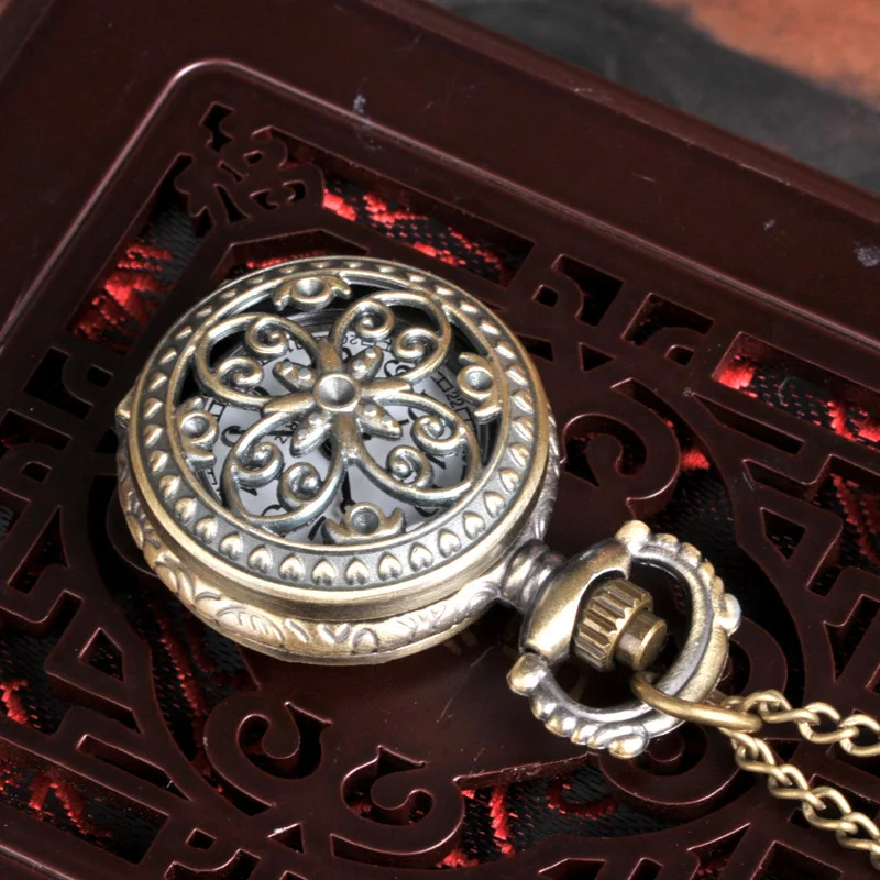 Small bronze four small petal pocket watch Retro hollow four flower petals pocket watch