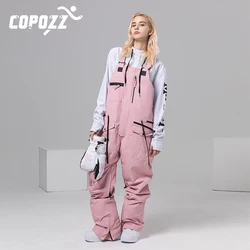 Pantaloni da sci posteriori da Snowboard tute antivento impermeabili in puro colore pantaloni da sci All-in-one uomo e donna attrezzatura da sci all'aperto