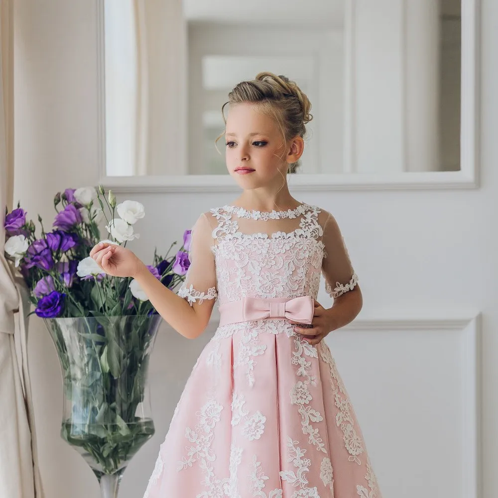 Abiti da ragazza di fiori eleganti abiti da spettacolo per bambini a cascata senza maniche con applicazioni in pizzo Champagne per matrimoni abiti da prima comunione