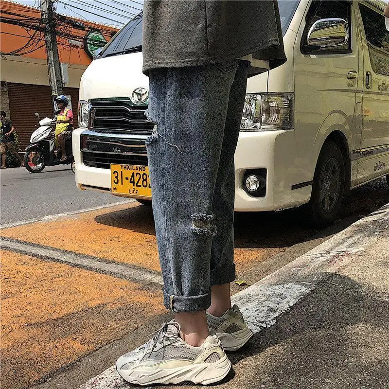 Jeans Pria Celana Panjang Lubang Lurus Denim Harajuku Chic Solid Celana Panjang Pria Gaya Korea Santai Streetwear BF All-Match In Longgar Remaja