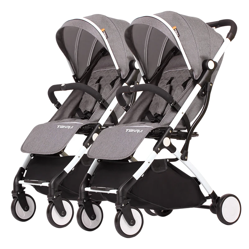 

TIANRUI twins baby stroller trolley can sit down and split children's portable folding two child twin car.